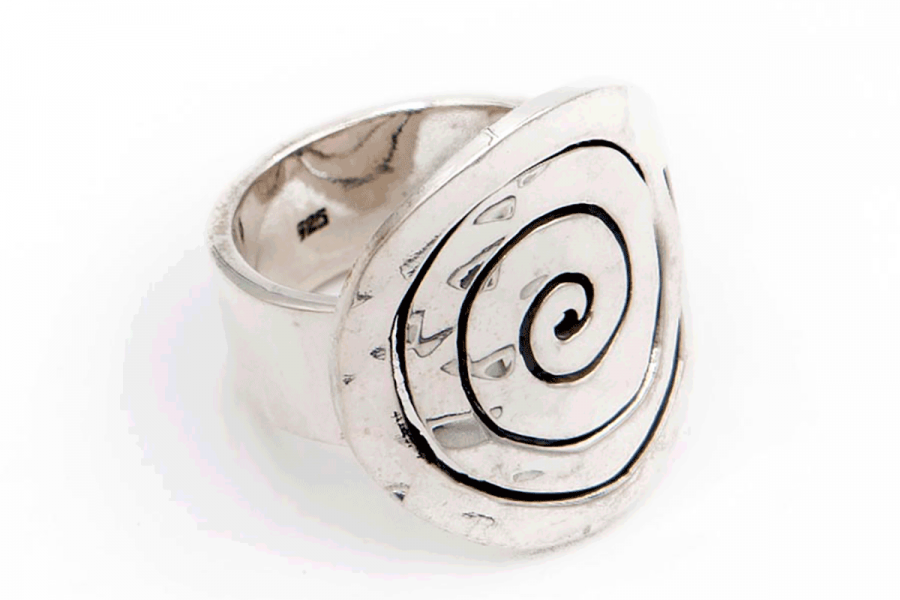 Distressed ovoid swirl ring
